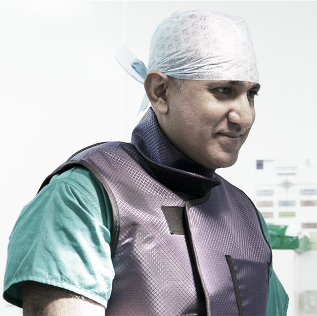 Photo of Nik Patel - Consultant Neurosurgeon in the operating theatre